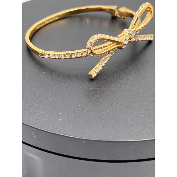 Kate Spade NY Skinny Mini Pave Bow
Gold Plated Hinged Bangle Feminine Bracelet - Picture 6 of 9